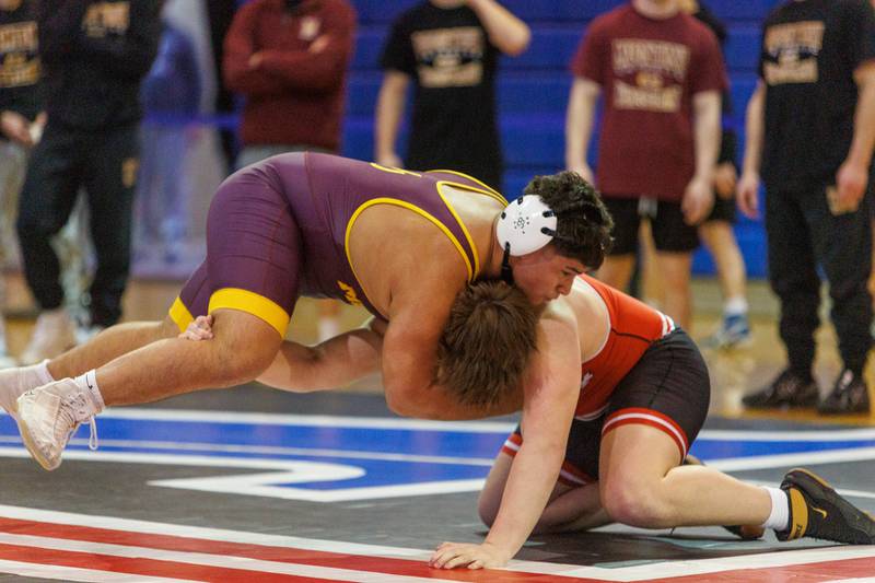 Montini's Sam Swamis and Marist's Tommy O'Brien competes in the 215 lb match  at the Marmion Class  2A Dual Team Sectional on Thursday, Feb. 5,2026 in Aurora.