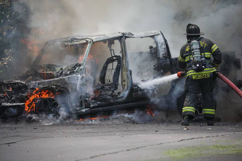 Woodstock Fire/Rescue District crews put out a vehicle fire on Friday, July 5, that gutted a late-model Jeep sitting at the top of a 900-foot-long driveway.