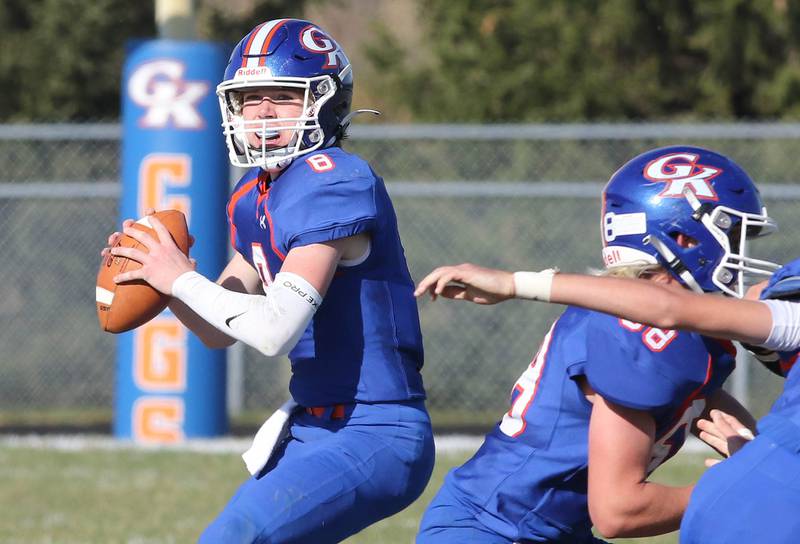 Genoa-Kingston's Nathan Kleba looks for a receiver during their first round playoff game against Elmwood Saturday, Oct. 29, 2022, at Genoa-Kingston High School.