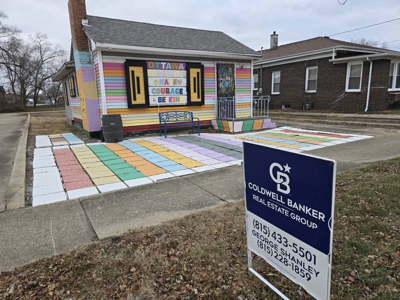 The rainbow-colored house at 1617 La Salle St. in Ottawa is listed for sale.