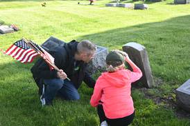 Photos: Veterans, Boy Scouts place flags at Peru City Cemetery 