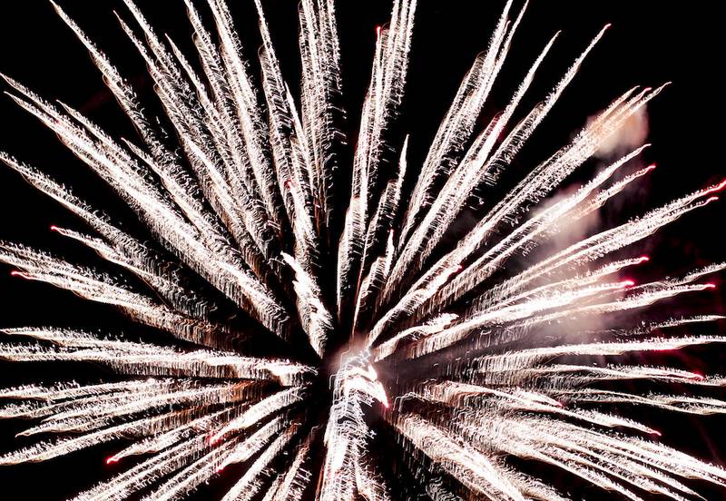 Fireworks explode Thursday, July 3, 2014, over Lions Park during the Cary Park District Summer Celebration in Cary.