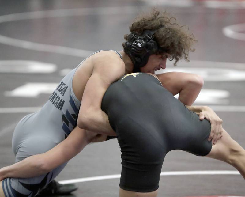Belvidere's Kamryn Labeau wrestleÕs Fremd's Maddox Khalimsky at 132-pounds during the IHSA 3A Individual Sectional wrestling meet at Barrington High School Saturday February 12, 2022.