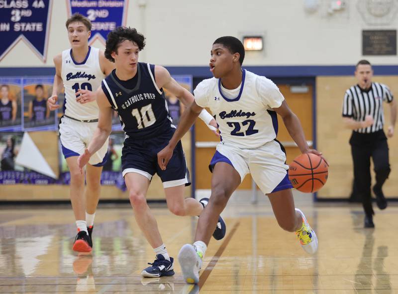 Riverside Brookfield's Steven Brown (22) brings the ball up court during the boys varsity basketball game between IC Catholic Prep and Riverside Brookfield in Riverside on Tuesday, Jan. 24, 2023.