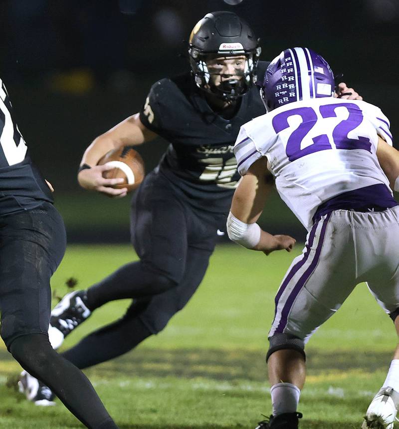 Sycamore's Burke Gautcher puts a move on Rochelle's Isaac Lopez during their game Friday, Sept. 22, 2023, at Sycamore High School.