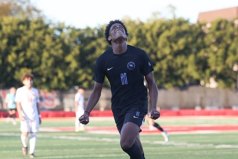 Lincoln-Way East’s Kamden Williams celebrates his first goal against Homewood-Flossmoor in the Class 3A Marist Regional semifinal on Wednesday, Oct. 23, 2024 in Chicago.