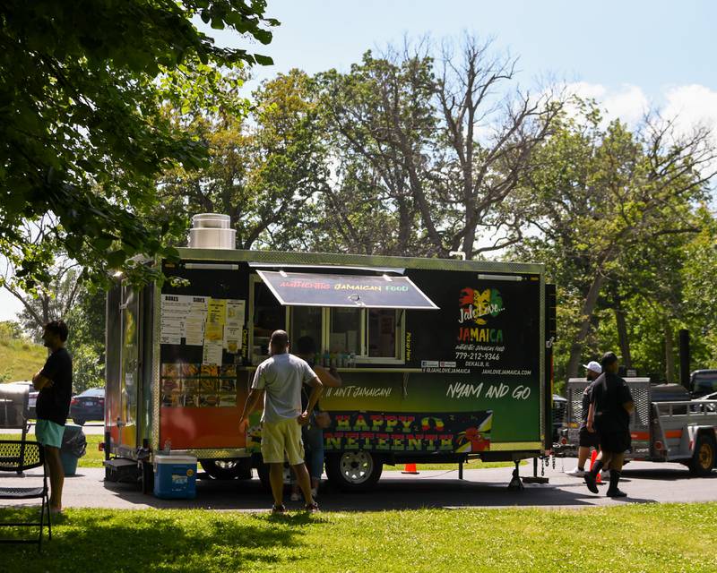 Food vendors offer treats at DeKalb's annual Juneteenth Community Celebration on Sunday, June 22, 2025, held at Hopkins Park.
