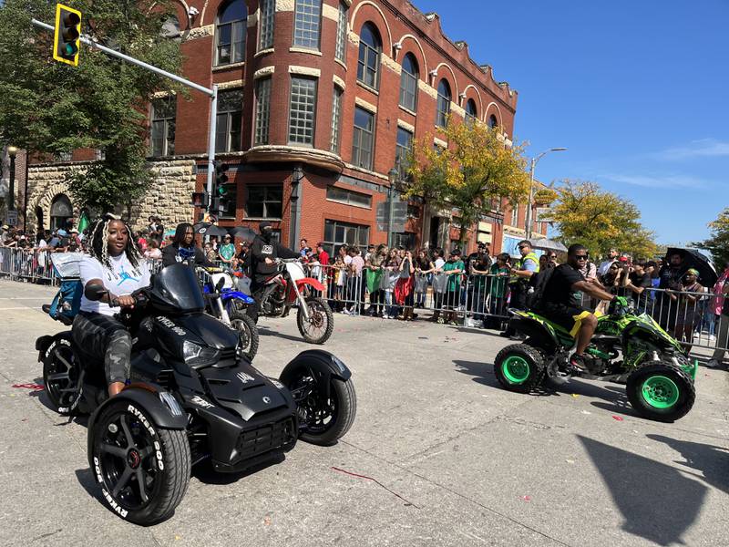 ATV and motorcross riders participating in the the 60th annual Mexican Independence Day parade on Saturday, Sept. 23, 2023, in downtown Joliet.
