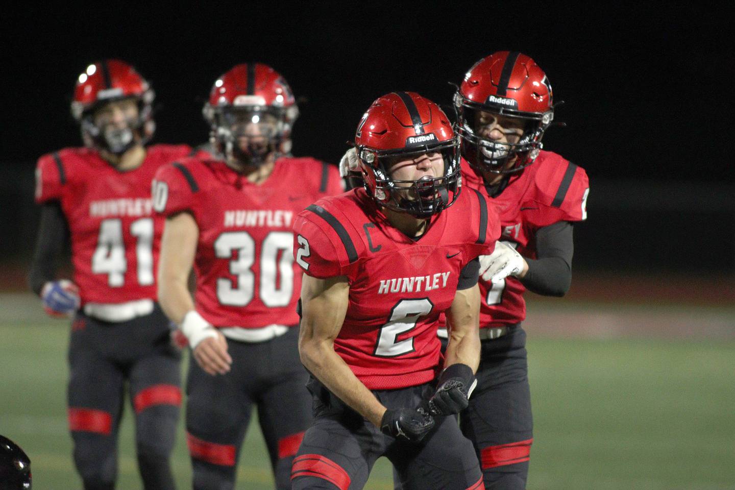 Huntley’s Zack Garifo celebrates after a defensive stop against Niles West in first-round Class 8A playoff football action at Huntley Friday.