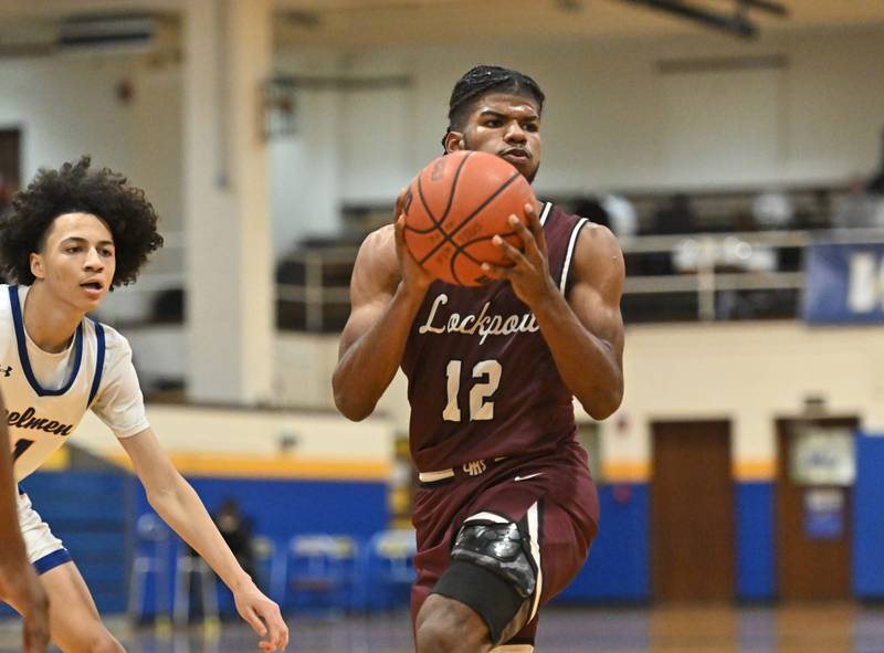 Lockport's Jalen Falcon looks to pass the ball against Joliet Central on Monday, Jan. 30, 2023, at Joliet.
