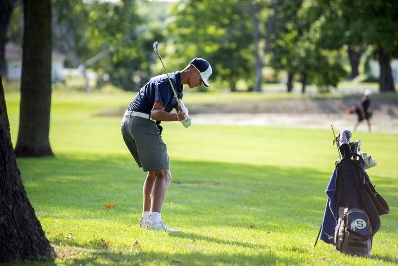 Sterling’s Mason Hubbard takes a shot towards the green on #1 while facing off against Rock Falls on Sept. 14, 2022.