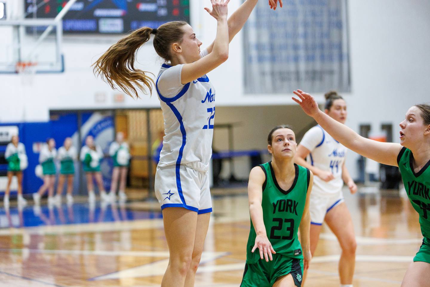 St. Charles North's Kaelie Tomalak shoots the go ahead three pointer against York in Overtime at the Class 4A Regional Final on Thursday, Feb.19,2026 in St. Charles.
