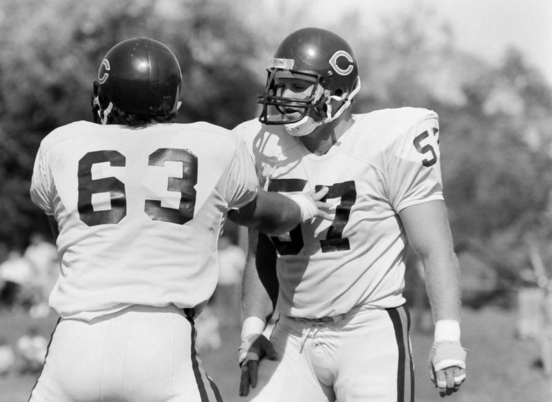 Chicago Bears offensive lineman Jay Hilgenberg and offensive lineman Tom Thayer work on drills during training camp on Wednesday, June 12, 1985 in Platteville Wis.