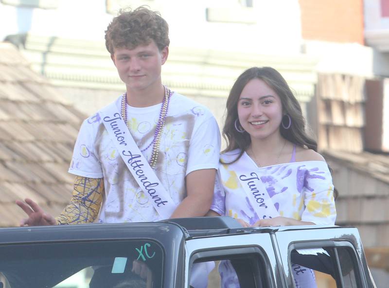 Mendota High School junior attendants Cole Kleckner and Michelle Cuevas ride down Indiana Avenue during the homecoming parade on Friday, Oct. 3, 2025