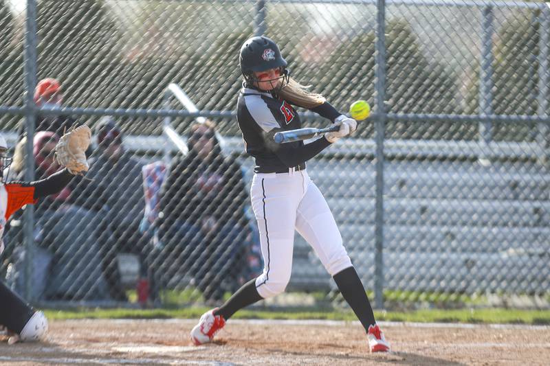 Lincoln-Way Central batter McKenzie Sheehan makes contact on Thursday, April 22, 2021, at Lincoln-Way Central High School in New Lenox, Ill.