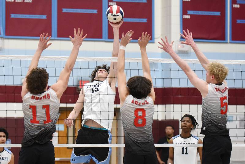 Kankakee's Eli Stipp, second from left, sends the ball over Bradley-Bourbonnais' Jacob Berns (11), Tate Marcotte (8) and Eli Hoekman (5) during the All-City game at Kankakee Thursday, April 10, 2025.