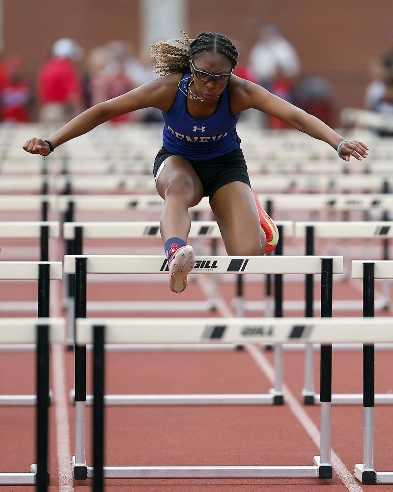 Alyssa Flotte of Geneva competes in the 100m Hurdles during the Kane County girls track and field meet at East Aurora High School Friday, May 2, 2025 in Aurora Ill.