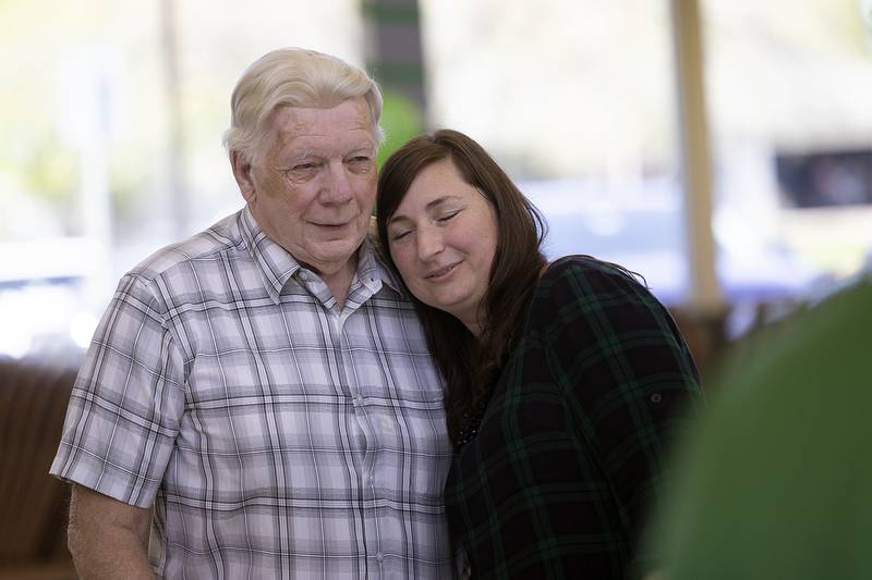 Former Rock Falls mayor David Blanton gets a hug from Rock Falls Chamber of Commerce President Bethany Bland during her going away party Thursday, May 4, 2023. Bland joined the chamber in 2005 and was named president in 2012.