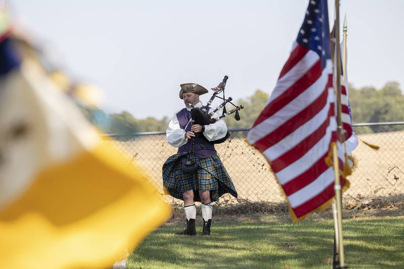 A member of the Northern Illinois Sons of the American Revolution Color Guard plays “America the Beautiful” on the bagpipes Saturday, October 5, 2024.
