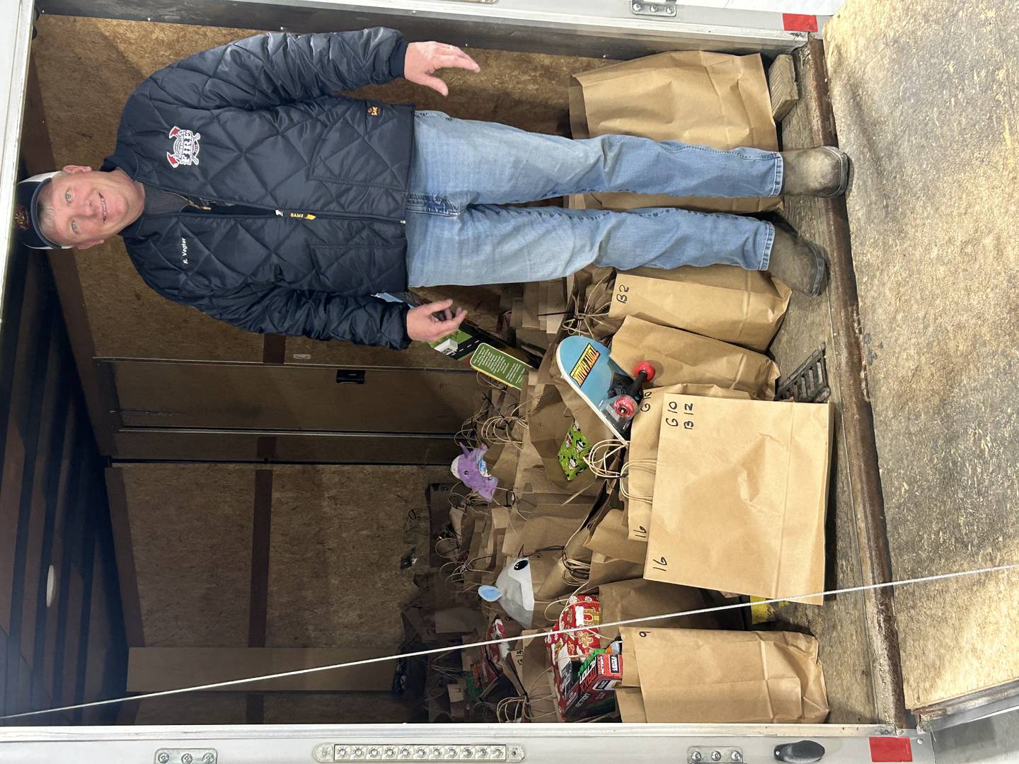 Morrison Fire Chief Rob Vegter is shown Friday, Dec. 19, with a trailer full of toys ready for distribution through the Morrison Fire Department's annual Caring for Our Community Toy Drive.