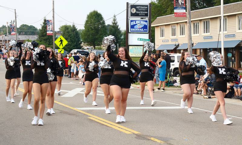 The Kaneland High School Dance Team, led by Team Captain Hailey Warner (center) performs in the Elburn Days parade on Friday, Aug. 18, 2023 in Elburn.
