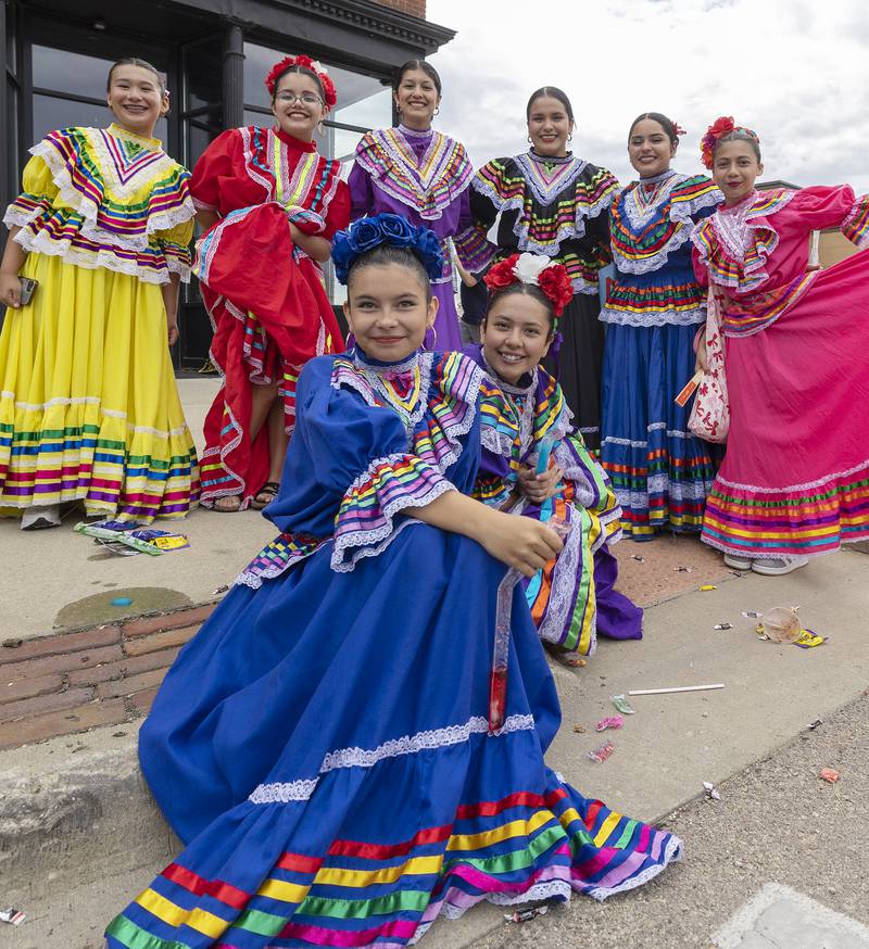 Ay! Jalisco dancers pose along the route after completing the Fiesta Parade Saturday, Sept. 20, 2025, in Sterling.
