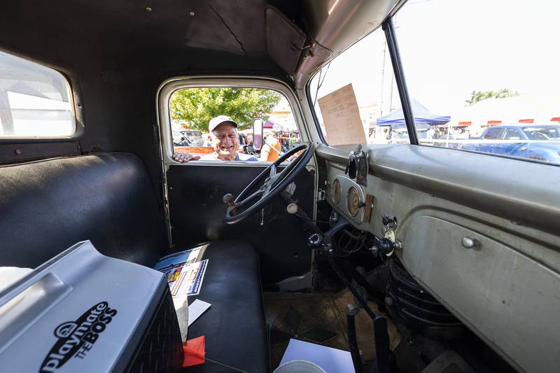 Edward Harden peeks on the inside of the 1937 Ford truck restored for father Alvin at Amboy’s Depot Days. Harden remembers taking the truck to Princeton to sell seed corn in the 50’s and 60’s. The last of 10 siblings, Harden brought the truck in to celebrate 170 years of family farming.