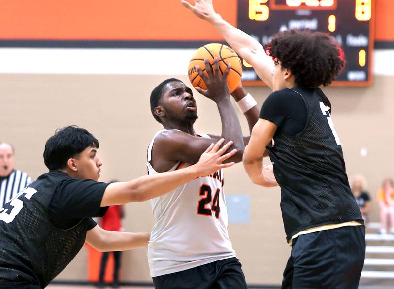 DeKalb’s Myles Newman goes to the basket Friday, June 20, 2025, during their game against Streamwood in the DeKalb Live summer tournament at DeKalb High School.