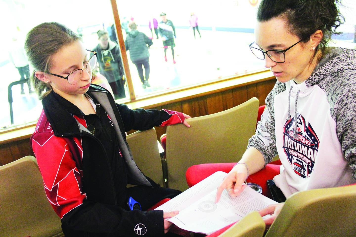 Constant learning and practice is key to being a successful curler. Lily's mother, Angela Haws, shows her strategy before playing at Waltham Curling Club's Mixed Bonspiel on March 7, 2025 in Triumph.
