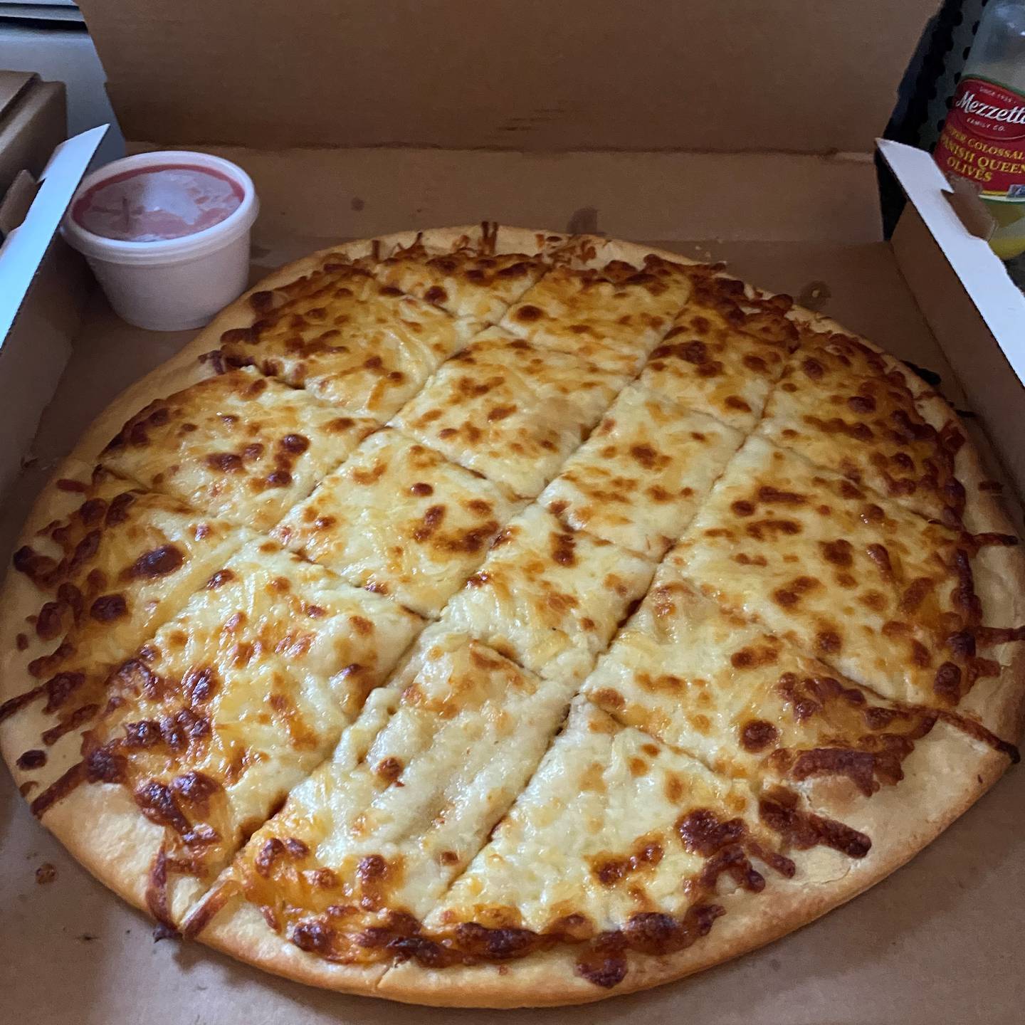 An order of cheese bread from Sam's Pizza.
