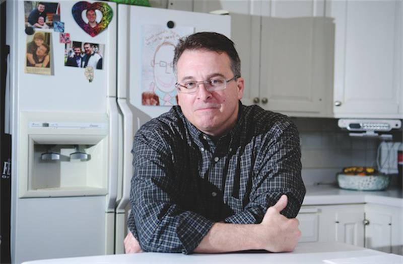 State Sen. Mike Jacobs sits in the kitchen of his home in East Moline. There, he likes to cook up breakfasts for his 13-year-old son and his friends on weekends when he's home from serving in Springfield. Jacobs is being challenged by former state Rep. Mike Boland in the March 20 Democratic primary for the 36th State Senate District seat.