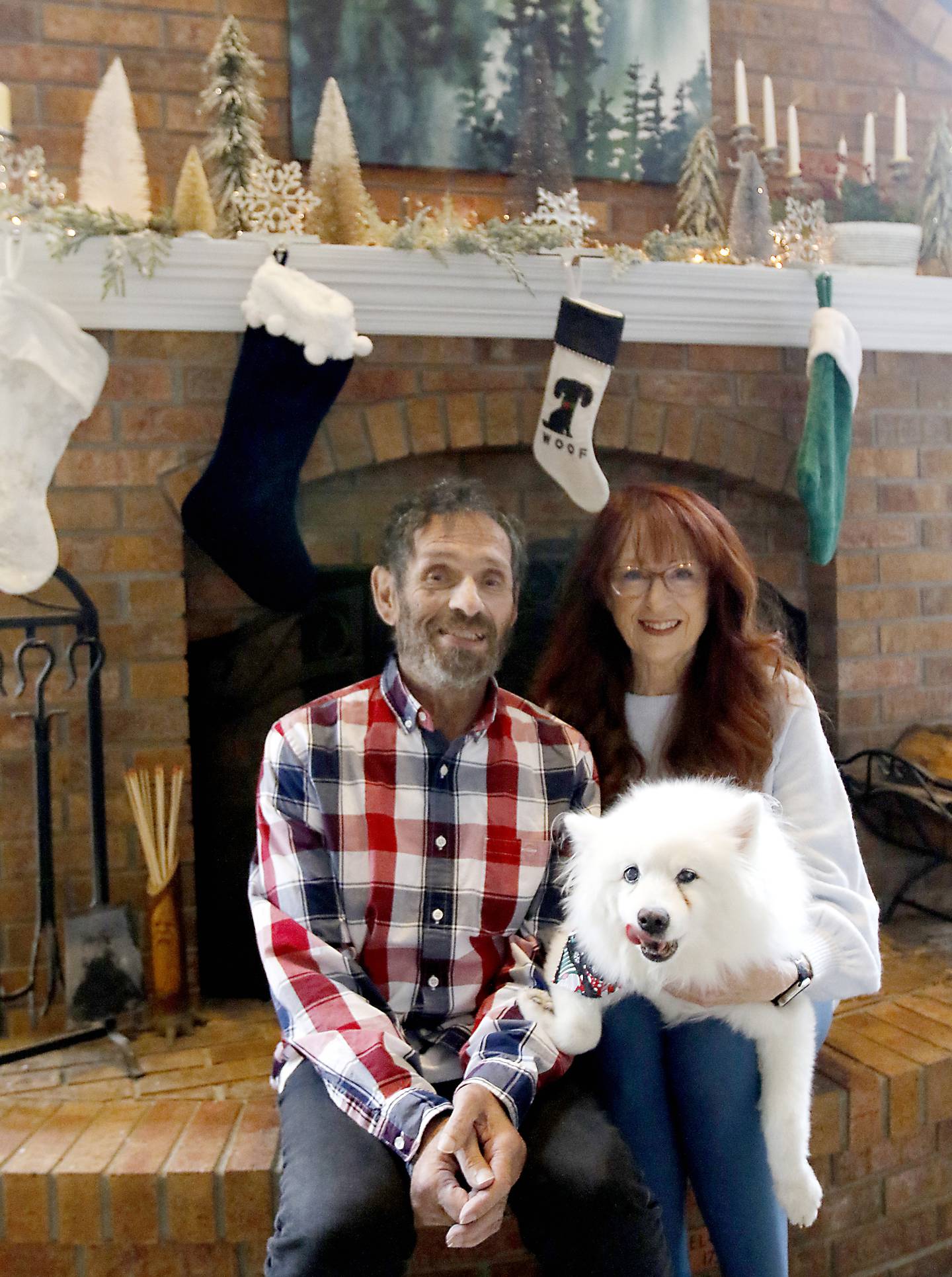 Mike Baber, who needs a kidney, and his wife, Teresa, and their dog, Iggie, at their home on Thursday, Dec. 12, 2024, in Marengo. Teresa has been approved as a donor but does not match Mike. They are hoping to find someone else willing to so a swap to get two people the kidneys they need.