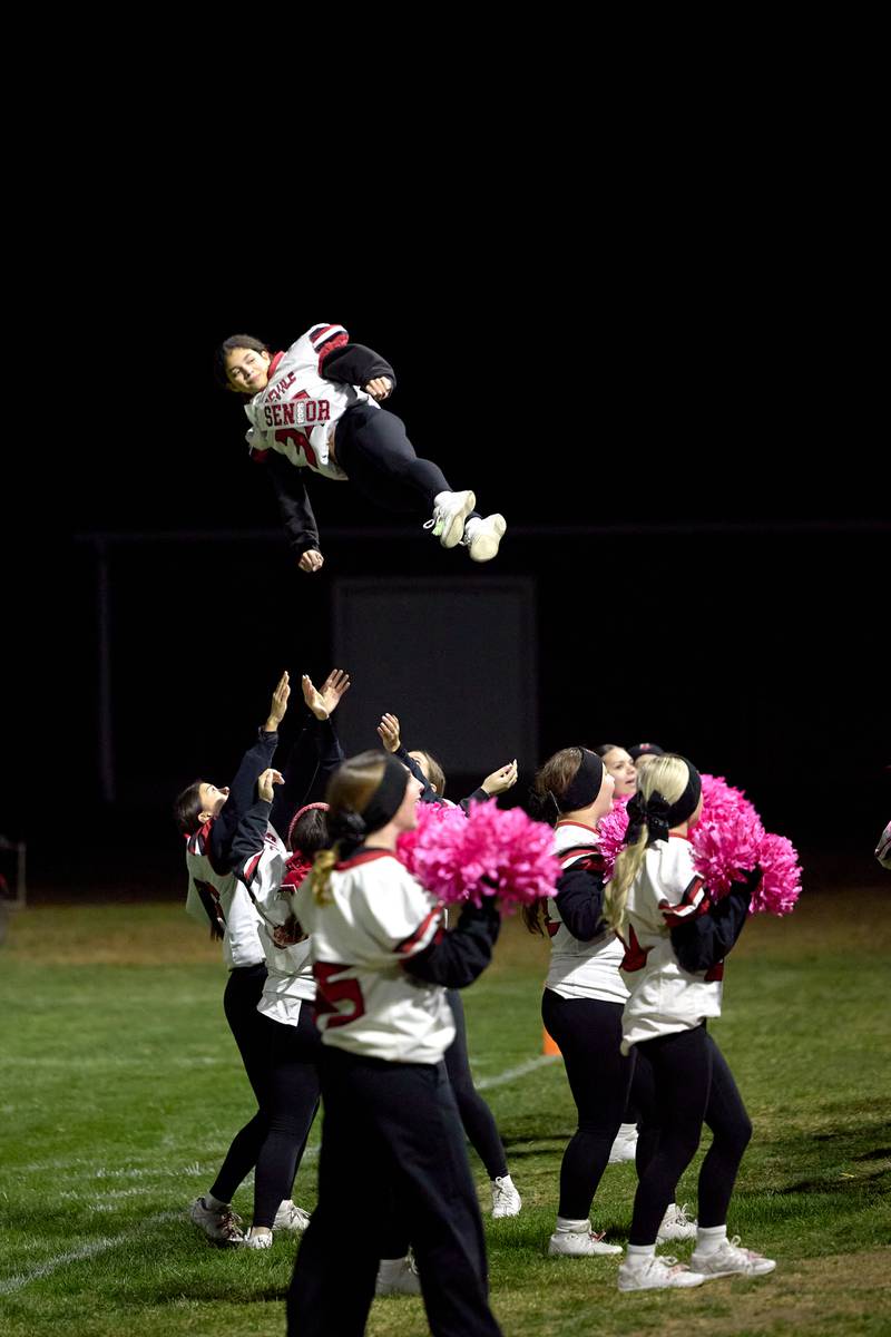 Hall cheerleaders perform on Friday, Oct. 24, 2025 at Richard Nesti Stadium.