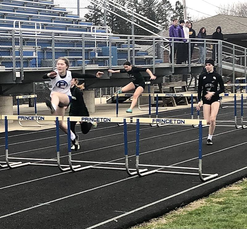 PHS sophomore Miyah Fox clears a hurdles on the way to a top time of 17.48 to win the 100 HH in Tuesday's Ferris Family Invite. The Tigresses defeated Rock Falls by nine points to win their own invitational.