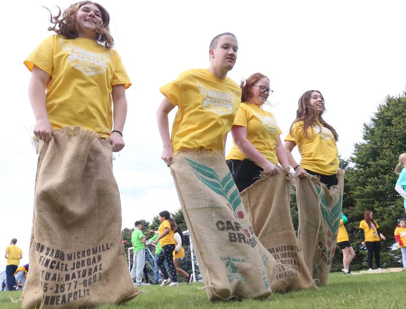 La Salle-Peru Township High School students participate in the sack races during the Wallace Warrior Games on Friday, May 8, 2026 at Wallace Grade School. The unified event promoted inclusiveness, friendships and fun. 25 schools and over 400 kids from La Salle, Bureau and Putnam Counties participated in the event.