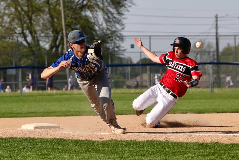 Princeton's Danny Cihocki tries to reach an errant throw to third base as Erie-Prophetstown's Connor Meadows slides in safely in the fourth inning Monday at Prather Field. Meadows scored on the Tiger error and the Panthers went on for an 11-8 win in Class 2A regional play.