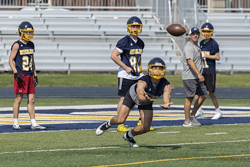Sterling players run through drills during first day of football practice Monday, August 7, 2023.