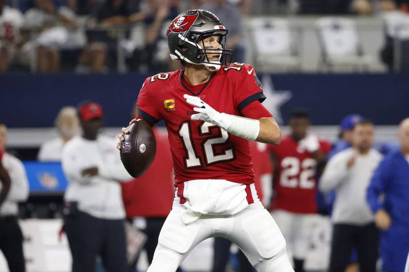 Tampa Bay Buccaneers quarterback Tom Brady (12) looks to throw against the Dallas Cowboys during an NFL football game in Arlington, Texas, Sunday, Sept. 11, 2022. (AP Photo/Ron Jenkins)