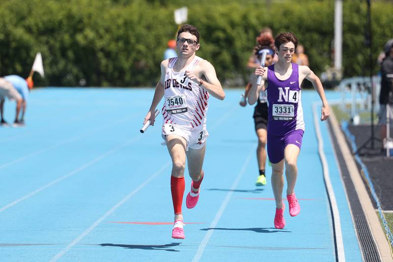 Hinsdale Central’s Dan Watcke holds the lead down the stretch in the Class 3A 4x800 Relay State Finals on Saturday, May 27, 2023 in Charleston.