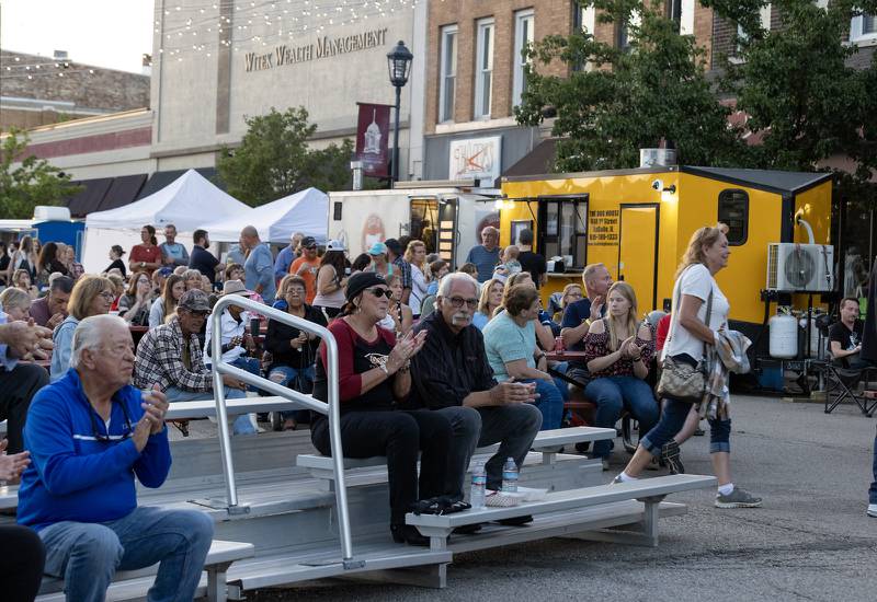 The crowd gathered on First Street in downtown LaSalle claps in appreciation for the musical performance on Saturday, Sept. 9, 2023 at the LaSalle Business Association's Jazz'N the Street event.