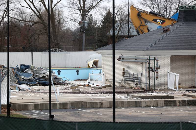 Demolition continues at Hopkins Pool Tuesday, December 10, 2024, in preparation for construction of a new pool set to open in 2026 at Hopkins Park in DeKalb.