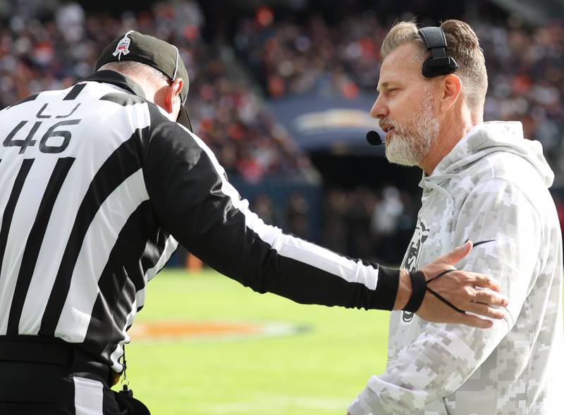 Chicago Bears Head Coach Matt Eberflus talks to an official during their game against the New England Patriots Sunday, Nov. 10, 2024, at Soldier Field in Chicago.