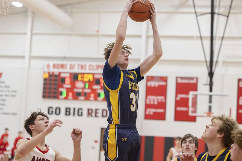 Polo’s Ryelan Lindass pulls down a rebound Wednesday, Jan. 25, 2023 in a game against Amboy.