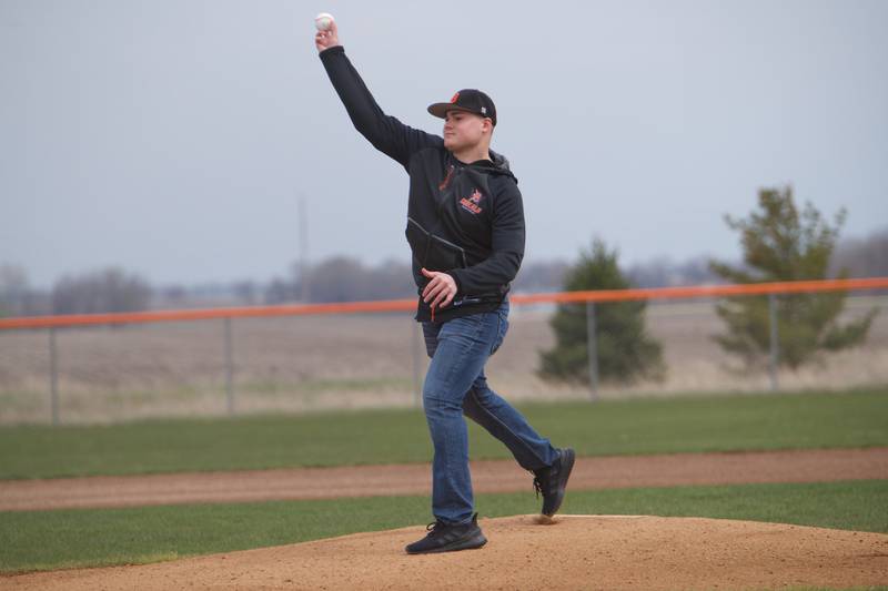 DeKalb Alum Zack Russel throws a ceremonial first pitch before the game of Sycamore VS DeKalb on April 30, 2022 in DeKalb.