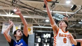 Photos: St. Charles East boys basketball hosts Marmion