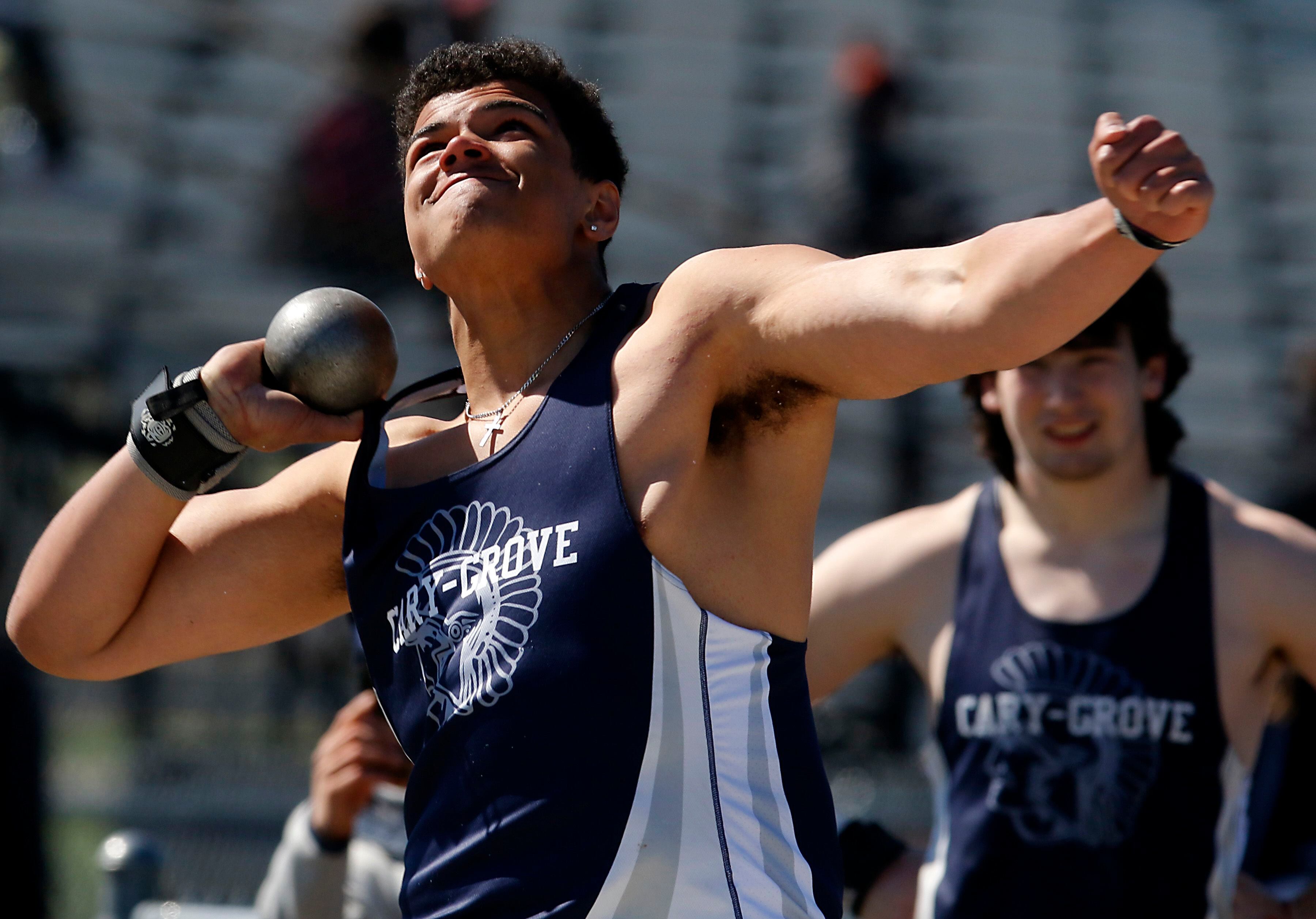 Cary-Grove’s Reece Ihenacho throws the shot putt on Friday, April 19, 2024, during the McHenry County Track and Field Meet at Cary-Grove High School.