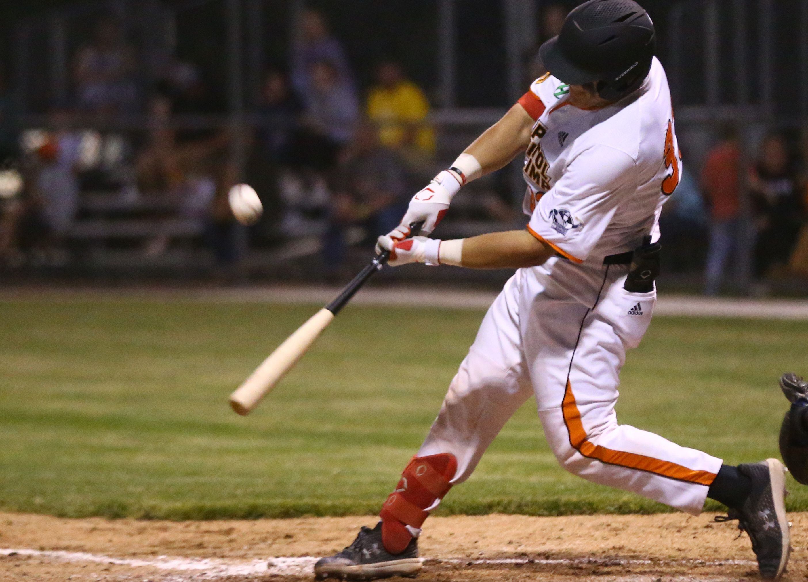 Pistol Shrimp's Logan Delgado hits the ball during the home opener against Rex Baseball on June 2, 2022, at Veterans Park in Peru. 