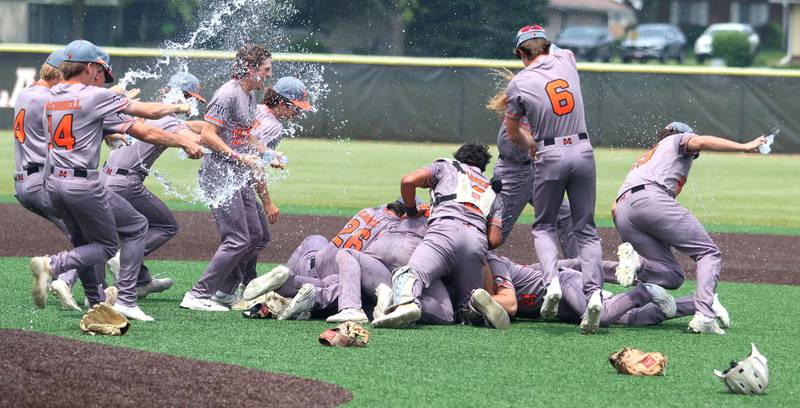 McHenry’s Warriors celebrate a win over  Barrington in IHSA Class 4A Sectional Title Game baseball action at McHenry High School in McHenry on Saturday, June 7, 2025.