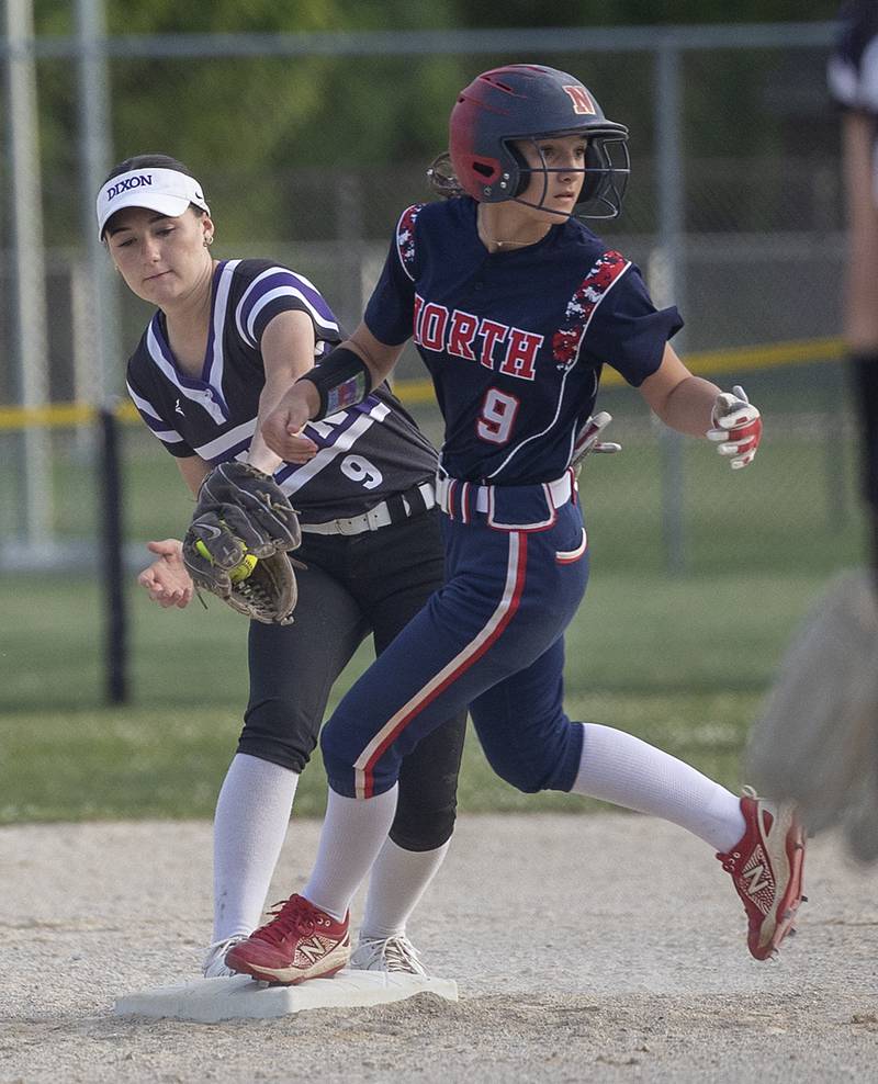 Dixon’s Taylor Frost gets an put at second against Belvidere North’s Gianna Giradin Tuesday, May 27, 2025, during a Class 3A Regional softball game in Dixon.