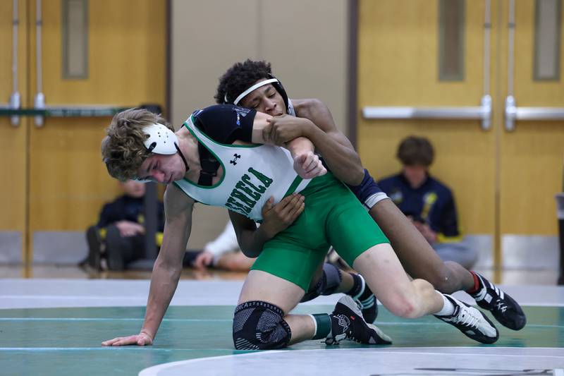 Seneca's Chase Rod wrestles Chicago Hope Academy's Santori Knight in the 150-pound third place match during the IHSA Class 1A Coal City Sectional on Saturday, Feb. 14, 2026.